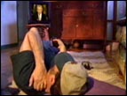Sean watching The 700 Club.