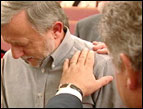 Waid Kidd gets prayed for at church