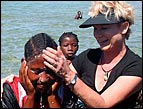 Heidi baptizes in the ocean