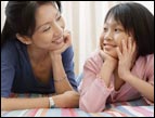 mother and daughter smiling