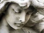 daily Devotion face of angel sculpture in stone