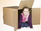 girl in cardboard box
