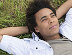 man resting in grass
